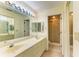 Bathroom with dual sinks and shower at 5612 Ashton Lake Dr # 5612, Sarasota, FL 34231