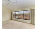 Spacious bedroom with large windows offering a water view at 5612 Ashton Lake Dr # 5612, Sarasota, FL 34231