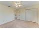 Spacious bedroom with double door closet and ceiling fan at 5612 Ashton Lake Dr # 5612, Sarasota, FL 34231