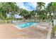 Relaxing community pool with lounge chairs at 5612 Ashton Lake Dr # 5612, Sarasota, FL 34231