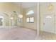 Spacious dining area with mirror and chandelier at 5612 Ashton Lake Dr # 5612, Sarasota, FL 34231