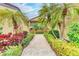 Landscaped walkway to condo building entrance at 5612 Ashton Lake Dr # 5612, Sarasota, FL 34231