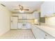 Kitchen with white cabinets and appliances at 5612 Ashton Lake Dr # 5612, Sarasota, FL 34231