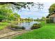 Serene pond with fountain, offering a picturesque view at 5612 Ashton Lake Dr # 5612, Sarasota, FL 34231