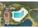 Aerial view of community pool with surrounding lounge chairs at 5612 Ashton Lake Dr # 5612, Sarasota, FL 34231