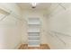 Large walk-in closet with shelving at 5612 Ashton Lake Dr # 5612, Sarasota, FL 34231