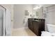 Bathroom with double vanity and toilet at 5640 Westwind Ln, Sarasota, FL 34231