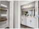 Modern bathroom with double vanity and linen closet at 5703 Tripoli Dr, Palmetto, FL 34221