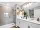 Modern bathroom with double vanity, large shower, and elegant tile work at 5703 Tripoli Dr, Palmetto, FL 34221