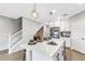 Kitchen island with sink and quartz countertop at 5703 Tripoli Dr, Palmetto, FL 34221