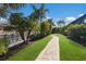 Landscaped walkway leading to the canal at 579 Fore Dr, Bradenton, FL 34208