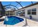 Stunning pool and spa with covered patio and outdoor kitchen at 579 Fore Dr, Bradenton, FL 34208