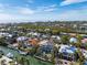 Beautiful waterfront home with balconies, a pool, and canal access, set in a scenic coastal community at 614 Norton St, Longboat Key, FL 34228