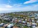 Waterfront home on a canal, enhanced with a pool and balconies, in a picturesque coastal community close to the beach at 614 Norton St, Longboat Key, FL 34228