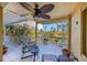 Spacious balcony with seating area and view of the tropical waterway and lush landscaping at 614 Norton St, Longboat Key, FL 34228