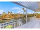 Scenic balcony overlooking a tranquil canal, showcasing the beautiful waterfront property at 614 Norton St, Longboat Key, FL 34228