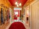 Hallway with painted walls that provides access to the living room, bedrooms, and bathrooms at 614 Norton St, Longboat Key, FL 34228