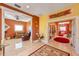 Hallway with tile flooring providing access to the living room, bedrooms, and bathrooms at 614 Norton St, Longboat Key, FL 34228