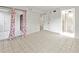 Bedroom with tile floors and access to balcony and bath at 6304 Pointe West Blvd # A206, Bradenton, FL 34209