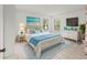 Main bedroom with a king-size bed and ample closet space at 6304 Pointe West Blvd # A206, Bradenton, FL 34209