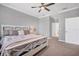 Bedroom with king-size bed and ensuite bathroom access at 6534 Clairborne Ln, Lakewood Ranch, FL 34211