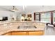 Granite countertops and stainless steel double sink in the kitchen at 6950 42Nd E Ct, Sarasota, FL 34243