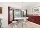 Cozy kitchen nook with a retro-style table and chairs at 6950 42Nd E Ct, Sarasota, FL 34243