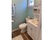 Clean bathroom with white vanity, toilet, and shower at 712 51St Avenue W Ter, Bradenton, FL 34207