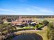 Luxury clubhouse with a stunning view of the golf course and surrounding landscape at 7121 Orchid Island Pl, Bradenton, FL 34202