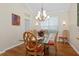 Bright dining room with hardwood floors and chandelier at 7121 Orchid Island Pl, Bradenton, FL 34202