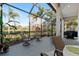 Large screened lanai overlooking a pond at 7121 Orchid Island Pl, Bradenton, FL 34202