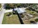 House and yard aerial view, showing driveway and lawn at 7307 9Th Nw Ave, Bradenton, FL 34209