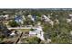 Aerial view of a house nestled in a neighborhood near a body of water at 7307 9Th Nw Ave, Bradenton, FL 34209