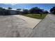 Front yard view of house, driveway, and street at 7307 9Th Nw Ave, Bradenton, FL 34209