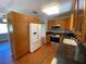 Kitchen with wood cabinets, granite counters, and stainless steel appliances at 7307 9Th Nw Ave, Bradenton, FL 34209