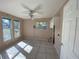 Laundry area with tile floor, cabinets and window at 7307 9Th Nw Ave, Bradenton, FL 34209