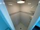 Clean shower stall with white tile and built-in shelves at 7307 9Th Nw Ave, Bradenton, FL 34209