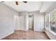 Bright bedroom featuring wood flooring and neutral walls at 7560 Plantation Cir, Bradenton, FL 34201