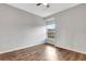 Bedroom with wood flooring and a window at 7560 Plantation Cir, Bradenton, FL 34201