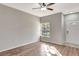 Bright living room with hardwood floors and a view of the backyard at 7560 Plantation Cir, Bradenton, FL 34201