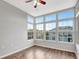 Bright sunroom with large windows and wood flooring at 7560 Plantation Cir, Bradenton, FL 34201