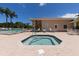 Relax in this community hot tub after a long day at 8240 Parkside Dr, Englewood, FL 34224