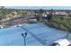 Aerial view of community tennis courts at 8240 Parkside Dr, Englewood, FL 34224