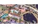 Aerial view of community amenities including a pool, tennis court, and clubhouse, perfect for active lifestyles at 8279 Varenna Dr, Sarasota, FL 34231