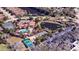 Aerial view of community amenities including swimming pool, tennis courts, and landscaping at 8279 Varenna Dr, Sarasota, FL 34231