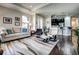 Cozy living room with neutral tones, hardwood floors, and ample natural light at 8279 Varenna Dr, Sarasota, FL 34231