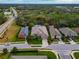 Aerial view of home showcasing its location in a quiet, established neighborhood with mature trees at 854 Rosemary Cir, Bradenton, FL 34212