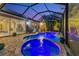 Night view of a relaxing pool and spa at 854 Rosemary Cir, Bradenton, FL 34212