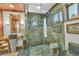 Spa-like bathroom with a large walk-in shower and stone wall at 903 20Th W Ave, Palmetto, FL 34221