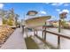 Private boat dock with lift for convenient access at 903 20Th W Ave, Palmetto, FL 34221